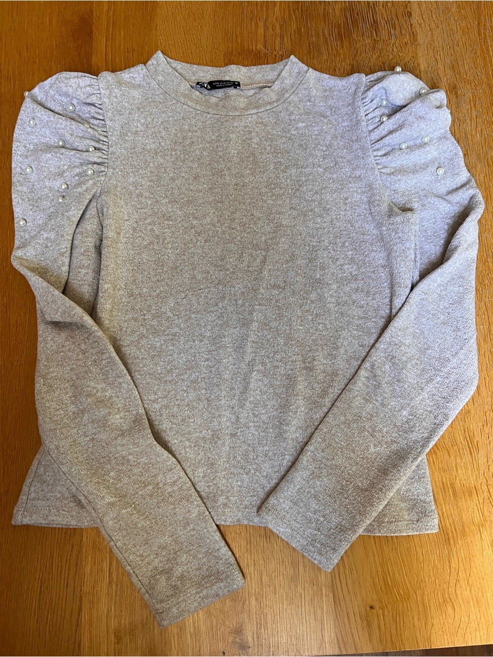 Zara Light heather oatmeal colour.